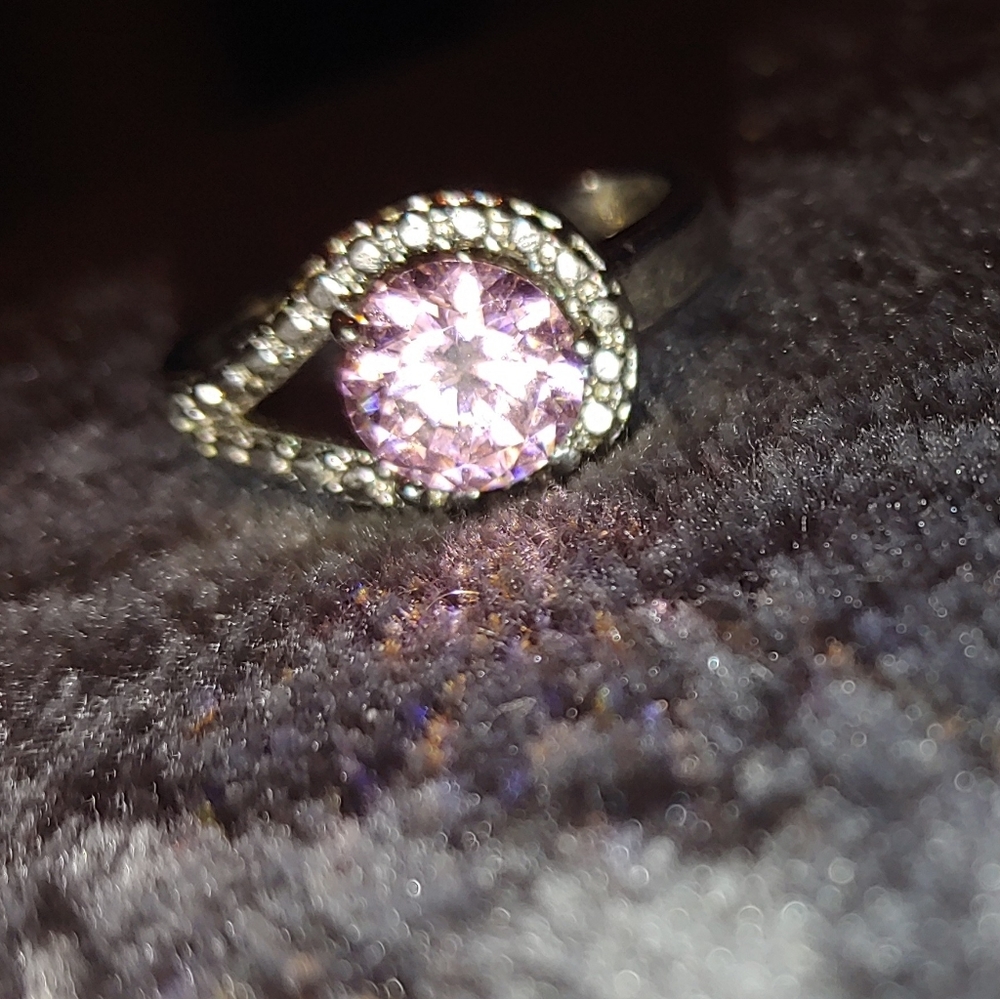 Sterling silver promise ring with pink jewel